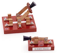 Single and double-pole KS Knife Switches with insulating bases and corrosion-resistant copper contacts for electrical safety testing.