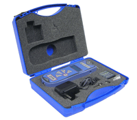 A blue hardshell carrying case containing a PFI series digital force gauge, power adapter, and various measurement attachments bedded in foam