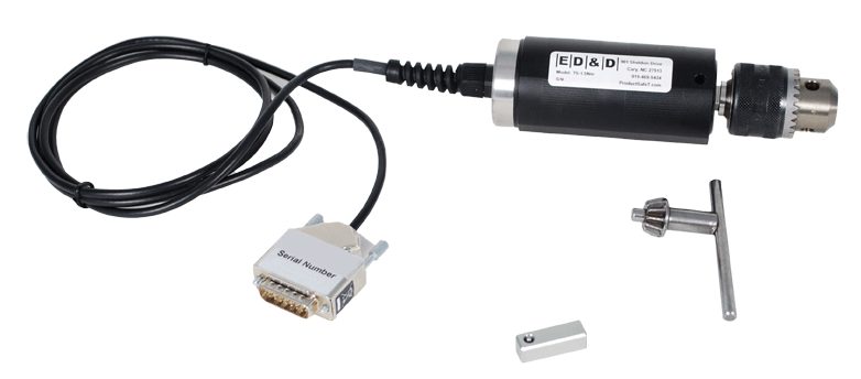 A black cylindrical smart torque screwdriver accessory with a 3-jaw chuck, featuring a data cable with a serial connector and an included chuck key