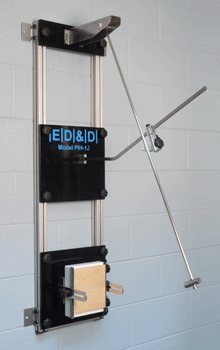 ED&D PIH-1J swing pendulum impact test apparatus for applying a defined 1 joule mechanical impact.